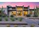 Beautiful modern home with desert landscaping and a stylish front entrance at 12809 N 67Th St, Scottsdale, AZ 85254