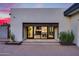 Modern home features a large sliding glass door with views to the interior living spaces at 12809 N 67Th St, Scottsdale, AZ 85254