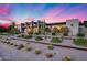 Modern home featuring desert landscaping with mature cactus and a captivating pink and blue sunset at 12809 N 67Th St, Scottsdale, AZ 85254