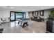 Entertaining game room featuring a pool table, stylish decor, and outdoor access at 12809 N 67Th St, Scottsdale, AZ 85254