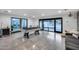Modern game room showcasing a pool table, sleek design, and natural light at 12809 N 67Th St, Scottsdale, AZ 85254