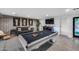 Well-designed game room featuring a pool table, comfortable seating, and modern lighting at 12809 N 67Th St, Scottsdale, AZ 85254
