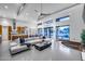 Spacious open-concept living area seamlessly connects the modern kitchen and dining space with neighborhood views at 12809 N 67Th St, Scottsdale, AZ 85254