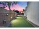 Backyard putting green for enjoying a leisurely round of golf at home at 12809 N 67Th St, Scottsdale, AZ 85254