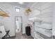 Well-organized walk-in closet with ample storage and natural light at 12809 N 67Th St, Scottsdale, AZ 85254
