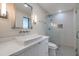 Modern bathroom features vessel sink, floating vanity, and glass enclosed shower at 15028 N 9Th St, Phoenix, AZ 85022