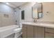 Bright bathroom with tub and shower combination, neutral walls, and modern vanity at 15028 N 9Th St, Phoenix, AZ 85022