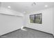 Bright bedroom with natural light, neutral walls, and carpet flooring at 15028 N 9Th St, Phoenix, AZ 85022