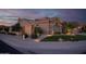 Inviting exterior with desert landscaping, a fire hydrant, and attractive stonework at 15664 W Vernon Ave, Goodyear, AZ 85395