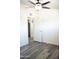 Bedroom featuring wood-look flooring, a ceiling fan and a closet at 2035 W Claremont St, Phoenix, AZ 85015