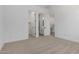 Bedroom with carpet, open doors lead to closet and ensuite bathroom at 24054 N 171St Dr, Surprise, AZ 85387