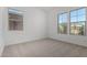 Bedroom featuring bright natural light and window at 24054 N 171St Dr, Surprise, AZ 85387