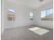 Bright bedroom with carpet, natural light and multiple windows at 24054 N 171St Dr, Surprise, AZ 85387