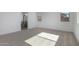 Bedroom featuring plush carpeting and an ensuite bath with a glass shower enclosure at 24054 N 171St Dr, Surprise, AZ 85387