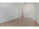Spacious room with tile flooring and ample natural light, ready for personalization at 24054 N 171St Dr, Surprise, AZ 85387