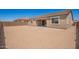 Large backyard with block fence, perfect for landscaping and outdoor activities at 24078 N 171St Dr, Surprise, AZ 85387