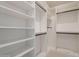 This walk-in closet has a built-in shelving system and plenty of space for storage at 3010 E Glenrosa Ave, Phoenix, AZ 85016