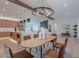 An open floorplan shows an eat-in kitchen and dining area with modern light fixture and decor at 3010 E Glenrosa Ave, Phoenix, AZ 85016