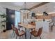 Dining room with modern lighting, adjacent to the kitchen, perfect for entertaining at 3010 E Glenrosa Ave, Phoenix, AZ 85016