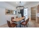 Dining room with modern decor and a sliding barn door to the pantry at 3010 E Glenrosa Ave, Phoenix, AZ 85016