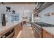 Bright, open kitchen with a large island, stainless steel appliances, and elegant wood cabinetry at 3010 E Glenrosa Ave, Phoenix, AZ 85016