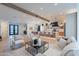 Open living space with a view of the modern kitchen and dining area at 3010 E Glenrosa Ave, Phoenix, AZ 85016