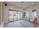 Bright living room with sliding glass doors to the lush backyard at 3010 E Glenrosa Ave, Phoenix, AZ 85016