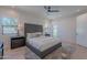 Luxurious main bedroom with natural light, a ceiling fan, and a king-size bed at 3010 E Glenrosa Ave, Phoenix, AZ 85016