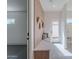 Charming mudroom boasts custom bench with storage and convenient hooks for organization at 3010 E Glenrosa Ave, Phoenix, AZ 85016