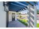 Covered patio featuring dark wood beams and outdoor lighting at 3010 E Glenrosa Ave, Phoenix, AZ 85016