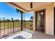 Cozy outdoor balcony with views of a golf course at 7061 E Broadway Rd # 48, Mesa, AZ 85208