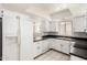 Bright kitchen with white cabinets and ample counter space at 7061 E Broadway Rd # 48, Mesa, AZ 85208