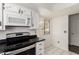 Close up of kitchen with stainless steel oven and microwave at 7061 E Broadway Rd # 48, Mesa, AZ 85208