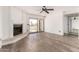 Inviting living room with a cozy fireplace and sliding glass doors to a private patio at 7061 E Broadway Rd # 48, Mesa, AZ 85208