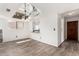 Bright living room showcasing hardwood floors, clerestory mirror, and an open-concept layout at 7061 E Broadway Rd # 48, Mesa, AZ 85208