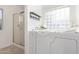 Bright bathroom featuring a Safe Step walk-in tub and a separate shower at 8757 W El Caminito Dr, Peoria, AZ 85345