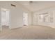 Bright bedroom with large windows and neutral carpet, providing a relaxing atmosphere at 8757 W El Caminito Dr, Peoria, AZ 85345