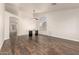 Spacious living room with hard wood floors, fan, and plenty of natural light at 8757 W El Caminito Dr, Peoria, AZ 85345