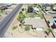 An overhead view showcases the desert front yard and green backyard of a corner-lot property at 9719 N 45Th Ave, Glendale, AZ 85302