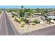 An elevated view of a well-maintained single-Gathering home situated on a corner lot in a neighborhood setting at 9719 N 45Th Ave, Glendale, AZ 85302