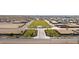 Well maintained community park, featuring expansive lawn area, landscaping and covered picnic areas in a residential area at 11422 E Utah Ave, Mesa, AZ 85212