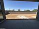 Large, undeveloped backyard featuring a block wall and plenty of space for landscaping at 11422 E Utah Ave, Mesa, AZ 85212