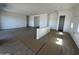 Spacious living area featuring tile flooring, bright white walls, and convenient access to storage at 11422 E Utah Ave, Mesa, AZ 85212