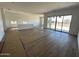 Expansive living space boasting tile flooring, recessed lighting, and sliding glass doors at 11422 E Utah Ave, Mesa, AZ 85212