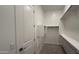 Spacious walk-in closet with custom shelving and hanging space at 11422 E Utah Ave, Mesa, AZ 85212