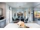 Bright dining area with views of the pool through a bay window, adjacent to the kitchen at 1282 W Kesler Ln, Chandler, AZ 85224