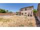Spacious backyard with gravel landscaping, offering privacy and room for customization at 12825 W Virginia Ave, Avondale, AZ 85392