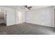 Primary bedroom featuring an ensuite bath and walk in closet at 12825 W Virginia Ave, Avondale, AZ 85392