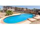 Enjoy this sparkling blue swimming pool, with brick trim and plenty of room for fun at 12825 W Virginia Ave, Avondale, AZ 85392