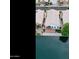 Stunning aerial view of waterfront property with a private dock and backyard patio at 14623 N 90Th Ln, Peoria, AZ 85381